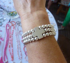 Silver cross bracelet - $150