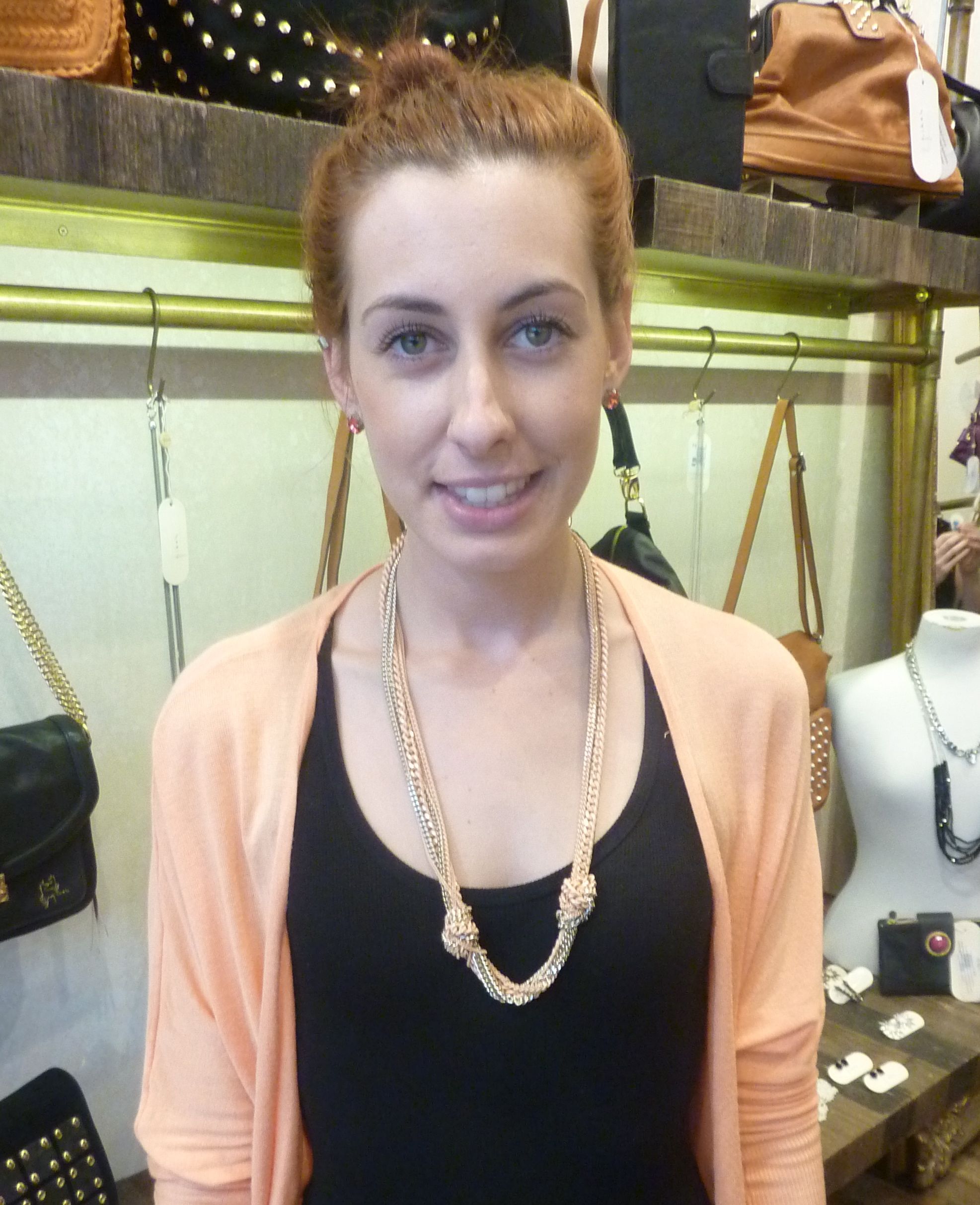 Jenna also works in store and teamed the Entangelemt necklace in Sherbet - $89 - nicely with her coral cardigan